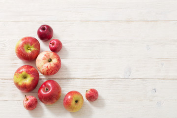 apples on wooden white background