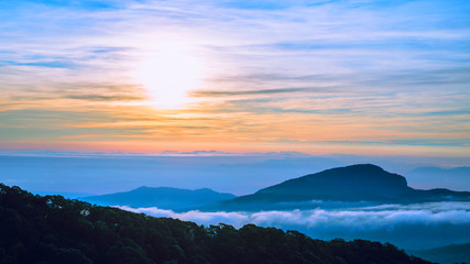 The background of nature with fog on the mountain. In the rainy weather in the countryside. winter
