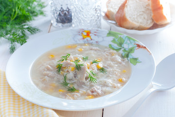 Corn and chicken soup, selective focus
