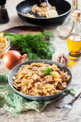 Creamy farfalle pasta with salmon, parmesan cheese and dill