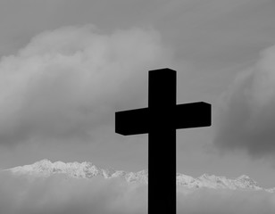 Black white silhouette big black cross crucifixion of Jesus Christ.