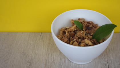 Kernels of nuts on a yellow background.