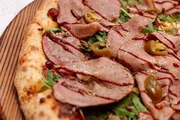 Pizza with roast beef and BBQ sauce