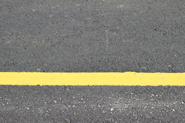 Fototapeta premium Asphalt texture with road markings background
