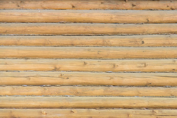 fragment of the walls of the house from a wooden beam