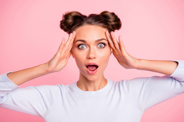 Close-up portrait of her she nice-looking lovely adorable attractive cheerful amazed girl with buns wow opened mouth isolated over pink pastel background - obrazy, fototapety, plakaty