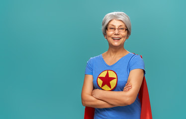 senior woman on teal background