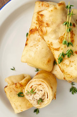 Savory crepe rolls with ground meat filling. Traditional Russian Shrovetide festival meal