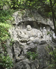 Fototapeta na wymiar Ancient stone statue of Happy Buddha, Xian, Shaanxi province, China