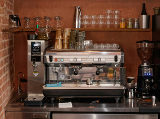 Espresso machine, hot water dispenser and coffee grinder