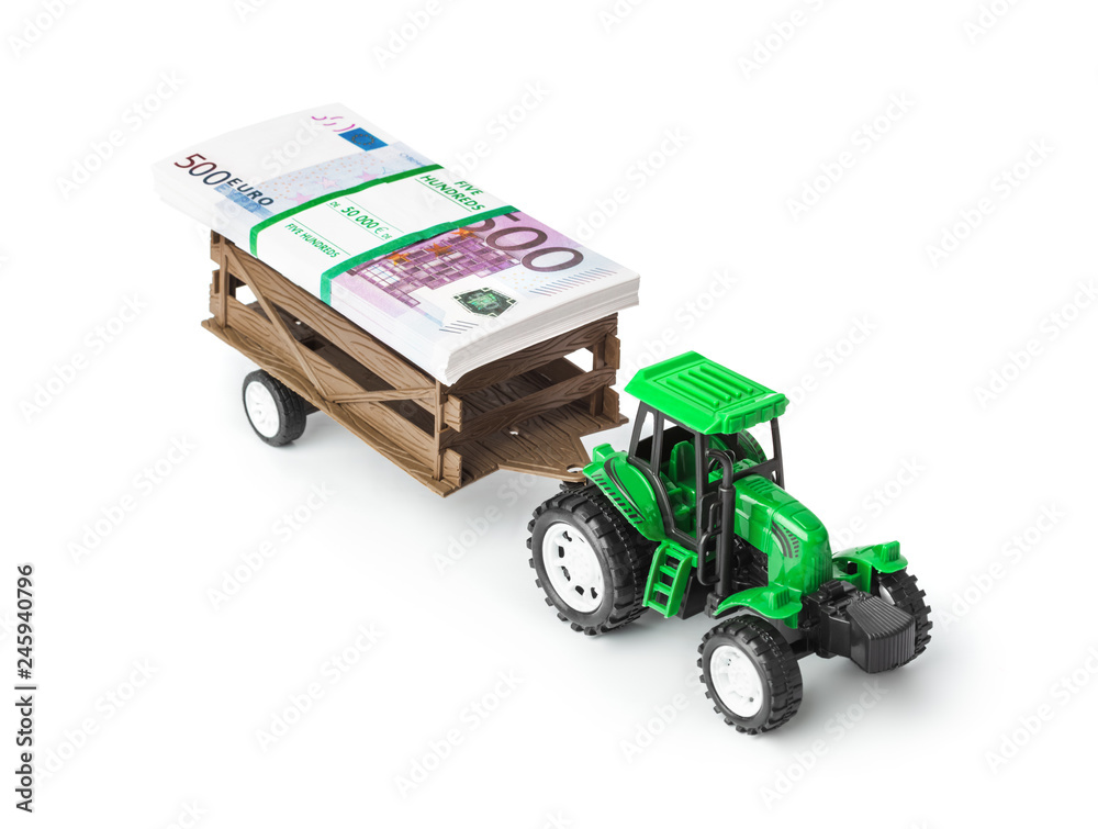 Wall mural Toy tractor with money