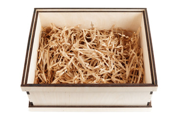 Wooden box with shredded paper, isolated