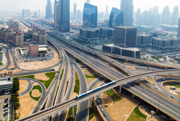 Aerial view Road traffic in city Dubai skyline