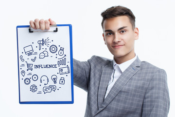 Business, technology, internet and networking concept. Young entrepreneur showing keyword: Influence
