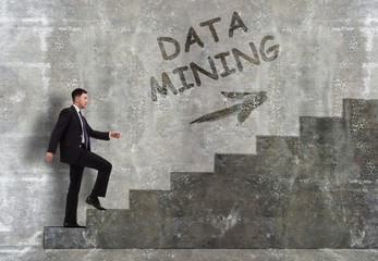 Business, technology, internet and networking concept. A young entrepreneur goes up the career ladder: Data mining