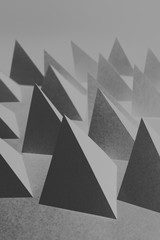 Pyramidal shapes of paper, composition for abstract background	
