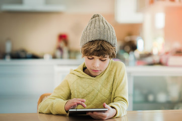 Little boy using digital tablet.