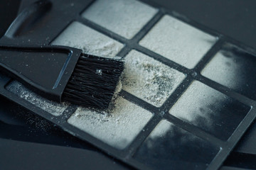 dirty dust filter.A layer of grey dust on the filter from the computer.dust cleaning in electronics...