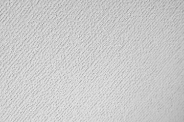  Roughness texture White wallpaper on the wall at a different angle. An example of old wallpaper.