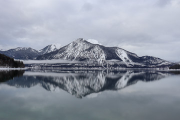 lake in mountains with rEflection