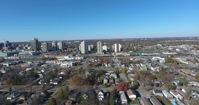 Flying Over Poor Neighborhood Lower Class Towards City Metropolitan Core 4 K Drone Video 002