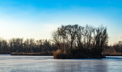 Naklejka na ściany i meble A frozen lake. Przylasek Rusiecki. Poland