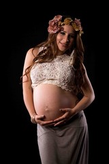 MS CS Pregnant woman in robe in studio