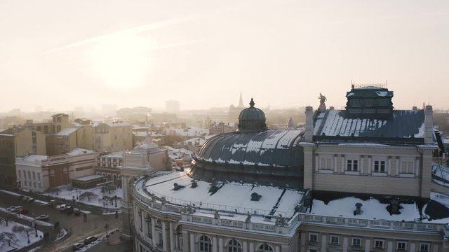 Cinematic aerial footage of opera and ballet theatre during sunny winter day