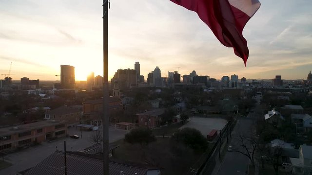 4k Texas Flag Aerial at Sunset with Austin