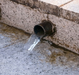 Flowing water from the tube outdoors