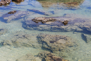 Sea rock. Rocks In the sea Image. Sea and rocks. Typical seascape