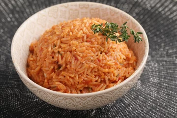 Zelfklevend Fotobehang Nigeriaanse Jollof Rice © StockphotoVideo