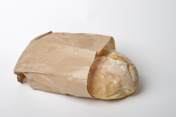 Loaf of bread in a paper bag