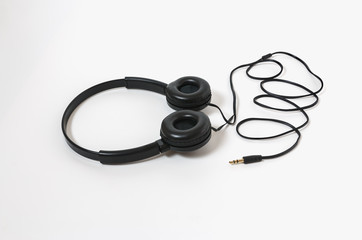 Fototapeta na wymiar Headphones black for music sound. Isolated on white background
