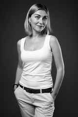 Beautiful businesswoman with short hair in black and white