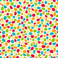 Round candy abstract seamless vector pattern. Multicolored dragee on a white background.