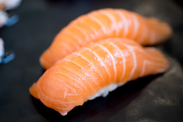 Japanese salmon nigiri sushi piece of uni gunkan