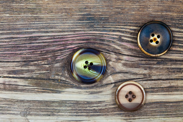 three old buttons