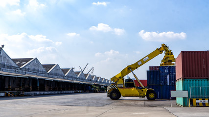 Container ship in export and import business and logistics. Shipping cargo to harbor by crane. Water transport International. 