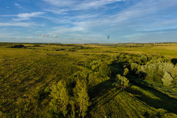 Obraz premium Many colorfull balloons in the sky at blue sky with clouds background 