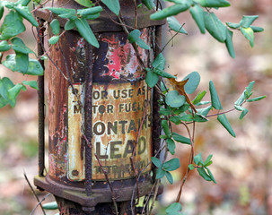 Contains lead sign on side of abandoned Mobilgas pump at fram