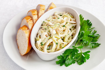 calamari, cucumber, and cabbage salad dressed with mayo and french mustard based sauce served with...