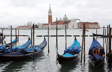 Obraz na płótnie Canvas Gondolas in Venice Italy Adriatic sea. Markusdom. St Mark's Basilica Square. Saint Marco Square. 