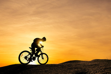Fototapeta na wymiar Extreme mountain bike sport athlete man riding outdoors lifestyle trail.