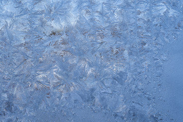 winter pattern of ice crystals on glass
