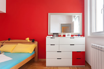 Cozy modern colorful bedroom interior with bed sheet