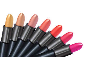 Obraz premium Set of colorful lipstick on white background. Make-up concept. Fashion Colorful Lipsticks