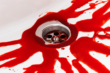 Flowing blood in the sink. Murder concept background
