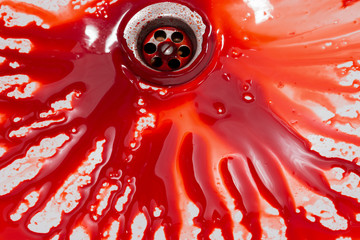 Flowing blood in the sink. Murder concept background
