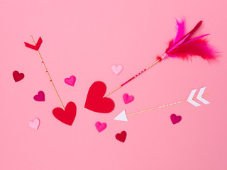 beautiful pink valentine background with love arrows and many hearts